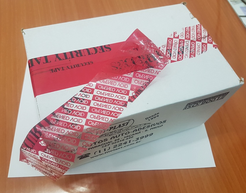 Fita de Empacotamento VOID Especial de Segurança - Vermelha e Preta - FOTO 1 Fita de Empacotamento VOID Especial de Segurança - Vermelha e Preta - FOTO 1